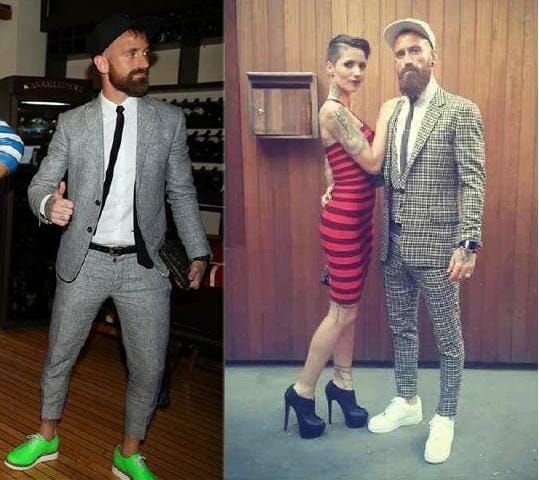 Left: Because matching your shoes to your suit is just too mainstream. Raul rocked his grey suit with a skinny black tie & blinding neon green shoes. Right: A snapback cap & suit? No one does it better than Raul! In a bold gingham all over suit he keeps the rest of his look neat with all white shoes & shirt. 