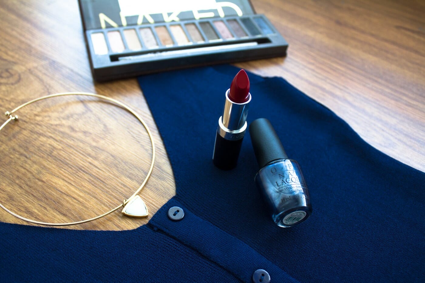 Necklace from ASOS, eye palette from Urban Decay, lipstick from Rimmel, nail polish from OPI.